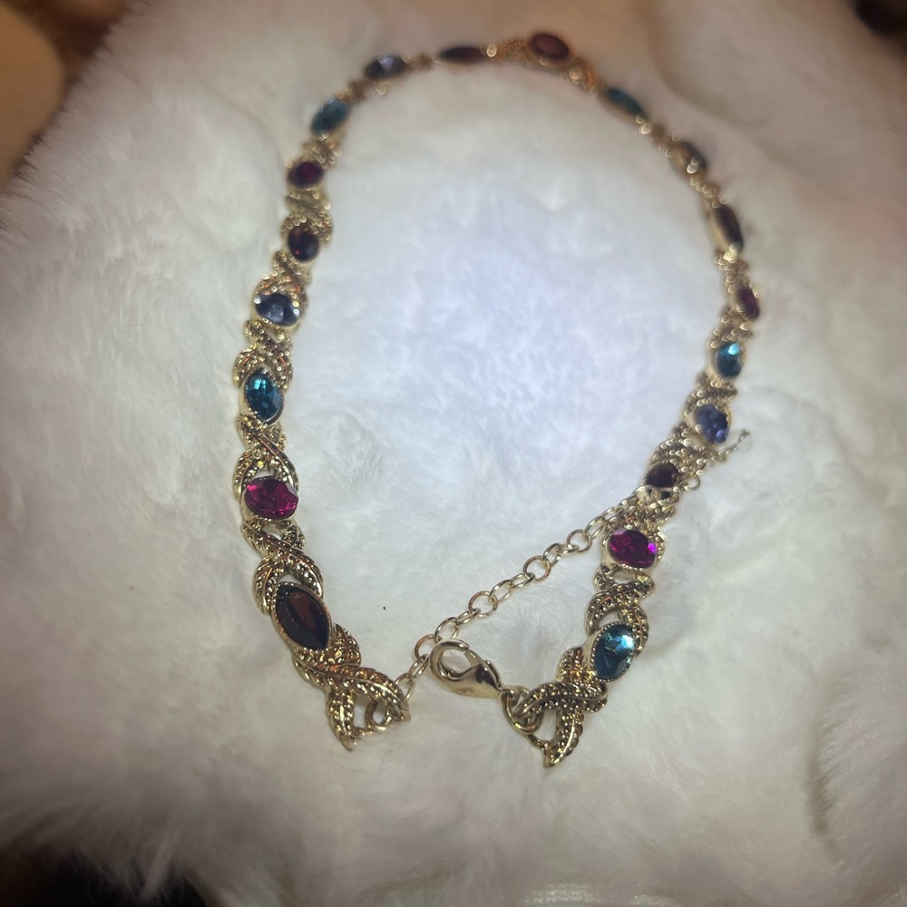 Gold tone and multicolor rhinestone leaf design necklace - Picture 10 of 12